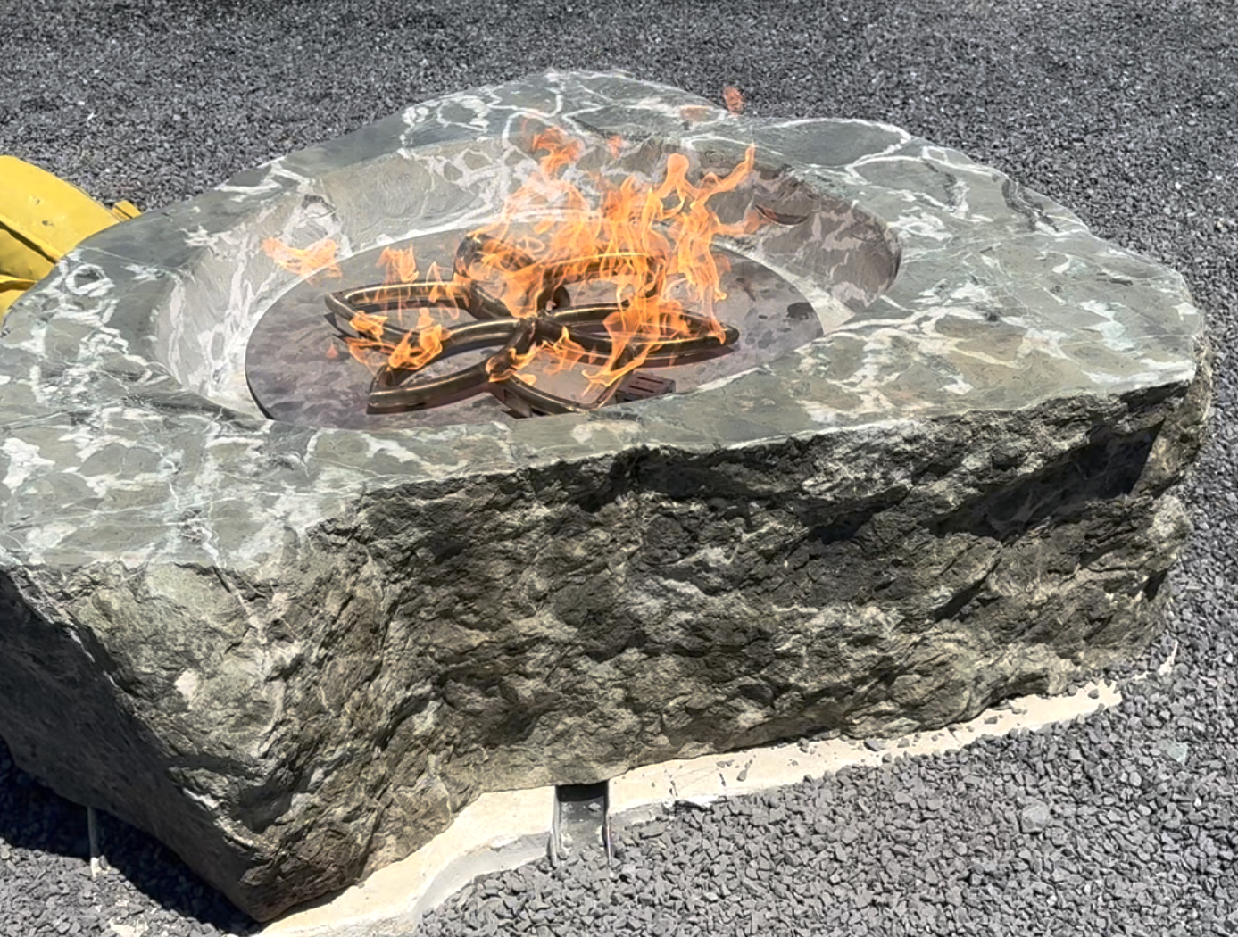  Fire pit fabricated from local stone on rooftop patio